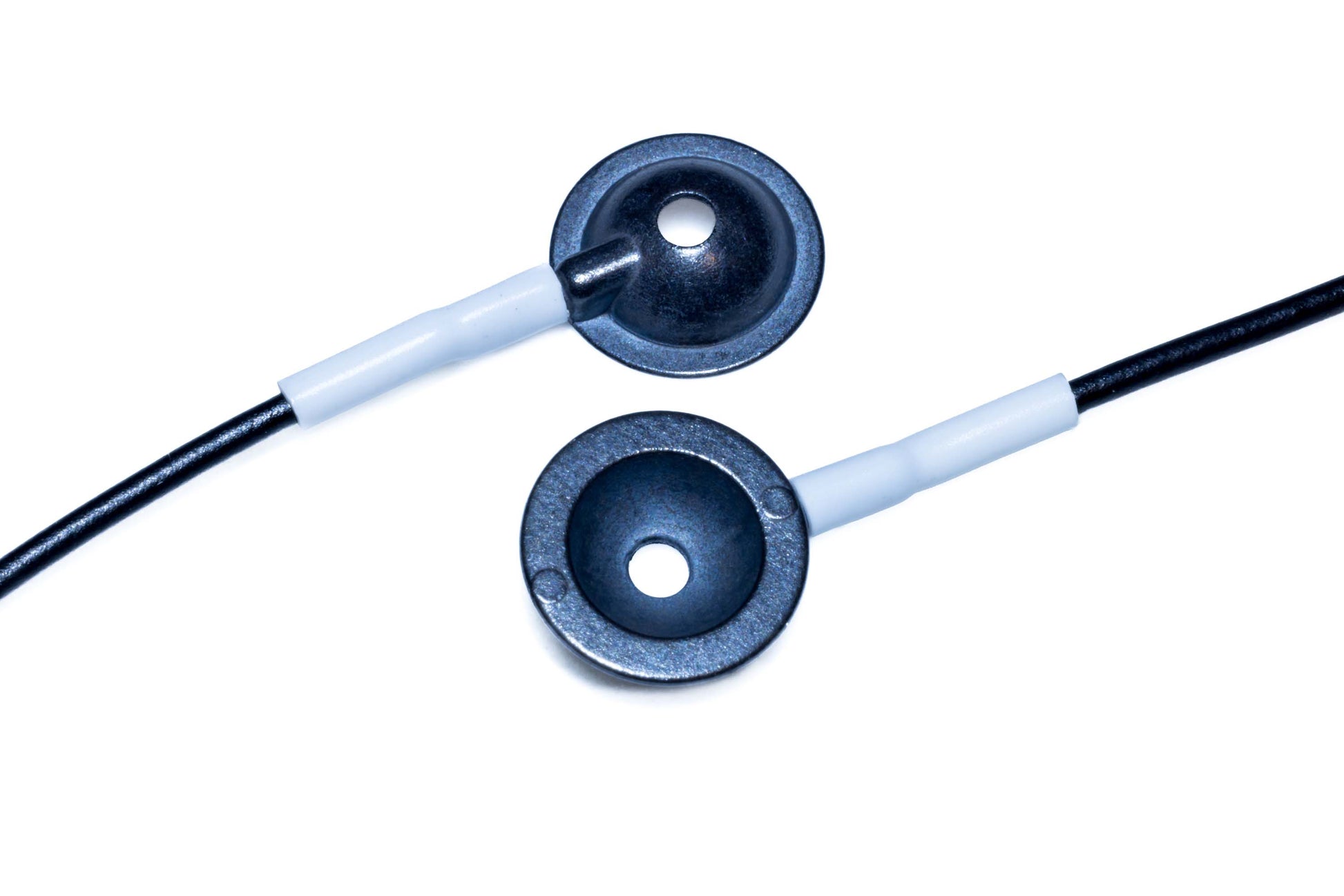 Close-up of disposable Ag/AgCl EEG cup electrode showing top and underside electrode design